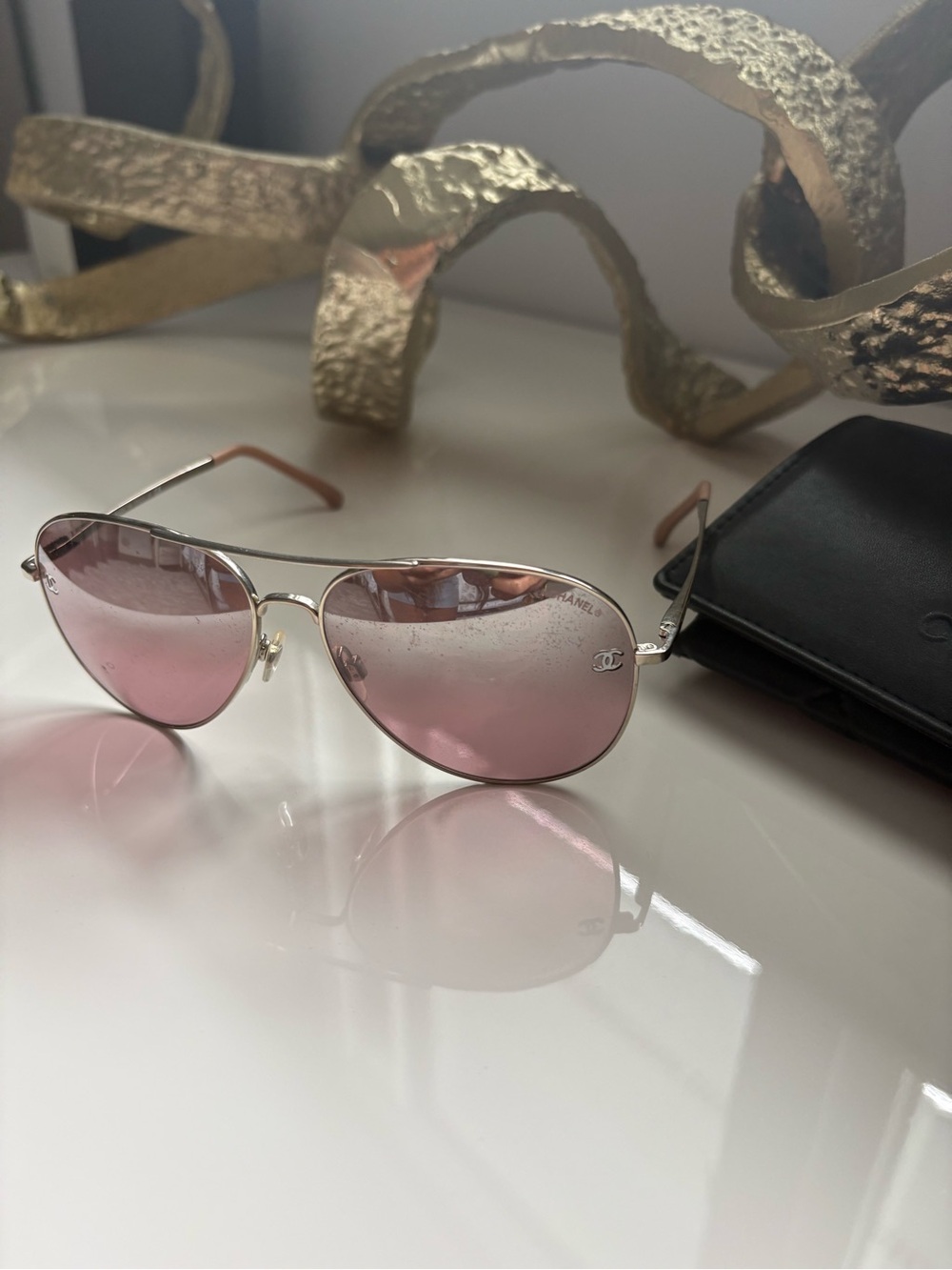CHANEL Silver Frame Sunglasses with Pink Lenses